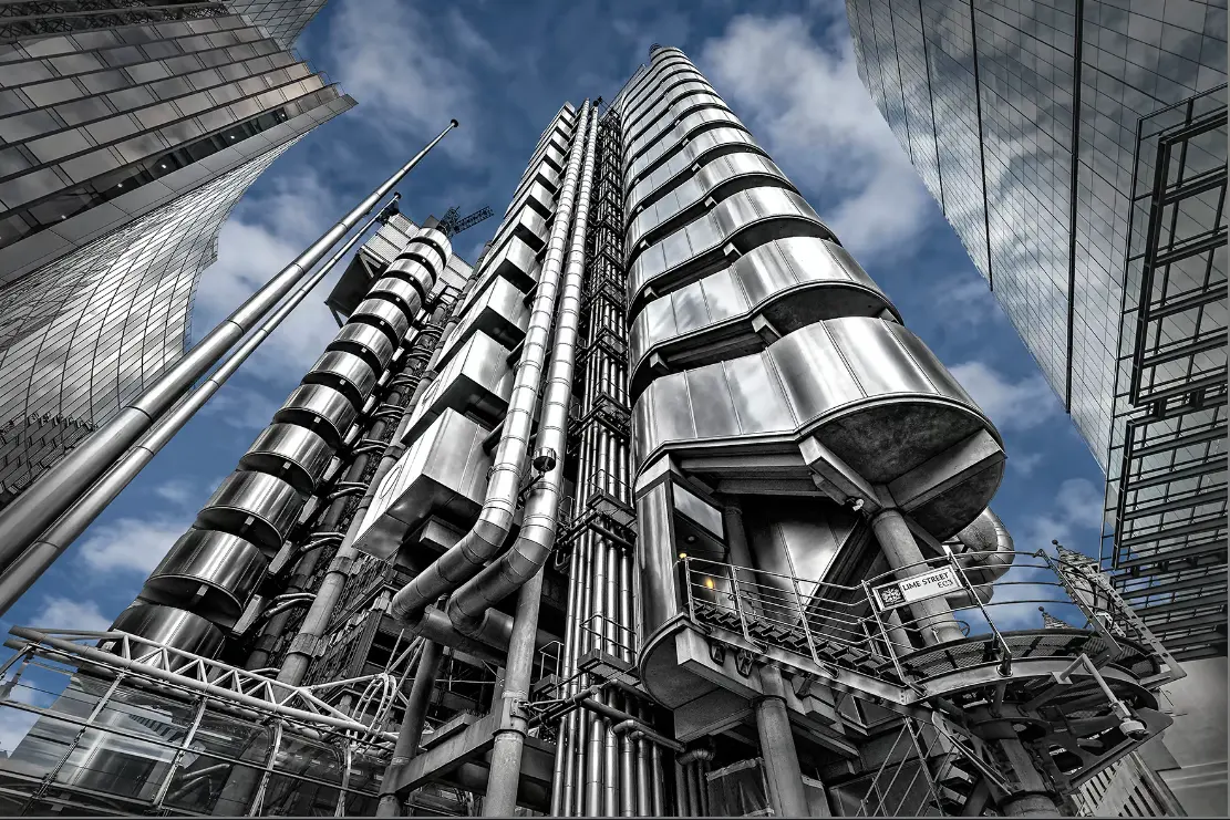 Lloyds of London building - Richard Rogers. Exposed services like chimney stacks on old buildings.