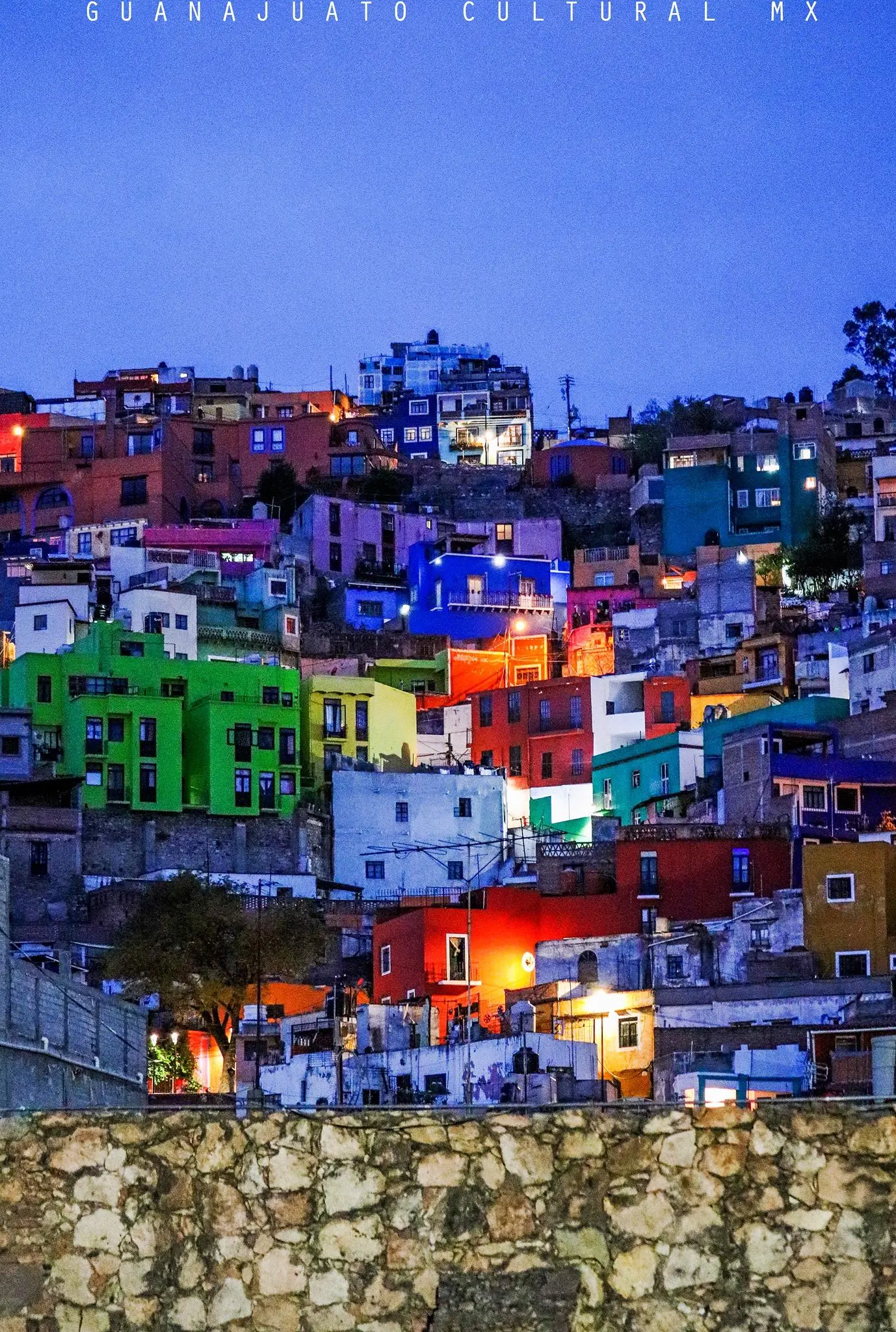 View of houses on hills that surround Guanajuato, Mexico. (Not my pic)